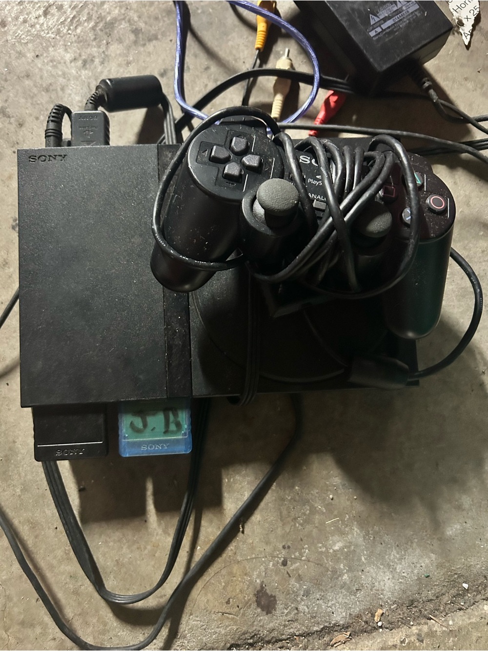 Sony PlayStation 2 Slim Console with Black DualShock Controller